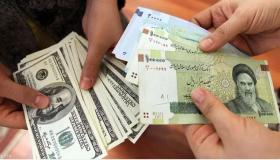 هبوط الريال الإيراني إلى مستوى قياسي أمام الدولار الأمريكي